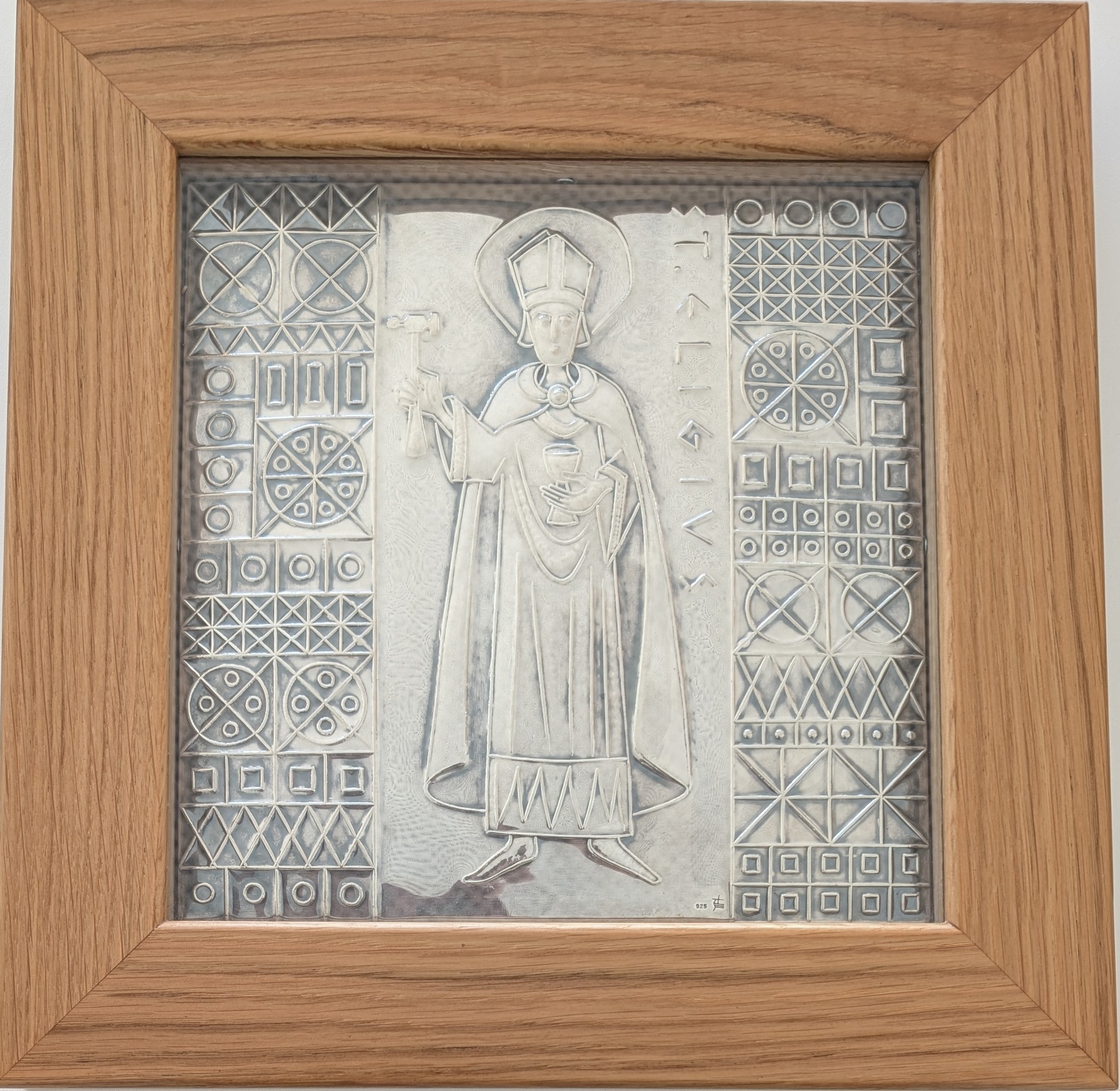 Darstellung des Hl. Eligius aus Silber, gerahmt.